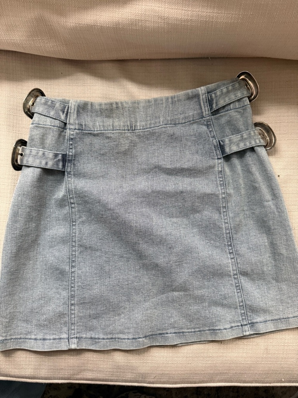 Light Wash Denim Mini Skirt with Buckle Accents